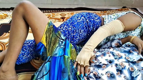 Desisarika in blue shorts spreading legs seductively on bed