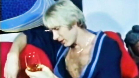 Retro blond man with hairy chest in open sweater holding drink, vintage porn teaser