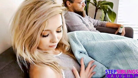 Blonde stepsister caught cuddling close with stepbrother under blanket on couch taboo tease