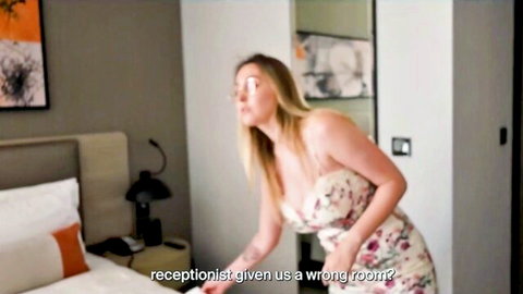 Blonde babe in floral dress bends over surprised in hotel room wrong booking tease