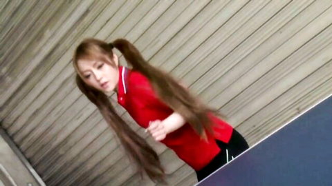 Cute Japanese pigtails babe in red uniform bends over table teasing