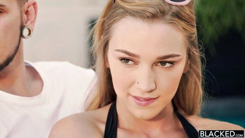 Kendra Sunderland in black bikini smiling poolside with man, Blacked.com teaser