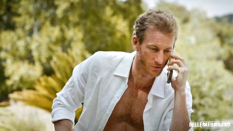 Handsome blonde man in open white shirt talking on phone outdoors, Abella Danger scene