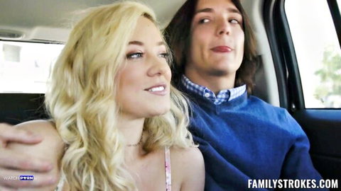 Blonde babe in pink top cuddles seductive guy in car backseat for FamilyStrokes taboo scene