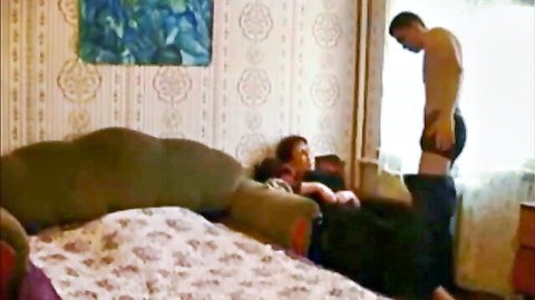 Amateur wife in threesome with younger men on couch, secretly recorded