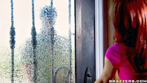 Monique Alexander in pink top approaches shadowy man behind prison bars for throat drilling