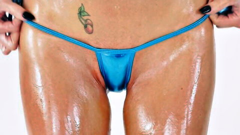 Silvia Saige oiled pussy close-up in blue thong reveal