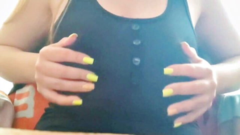 Curvy blonde with massive knockers squeezes her juggs in black tank top solo play