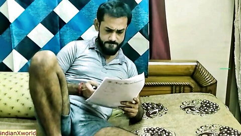 Indian man in homemade X-rated scene, sitting casually reading