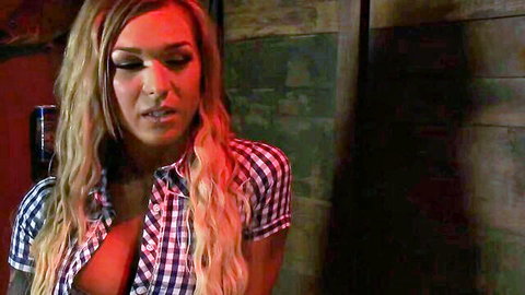 Blonde shemale in open checkered shirt showing cleavage