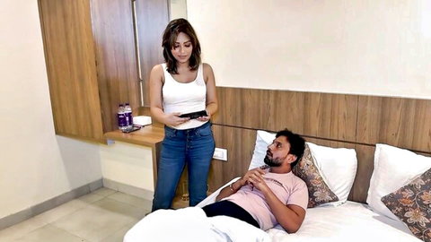Indian step-sis in white tank top and jeans teases lying best friend on bed