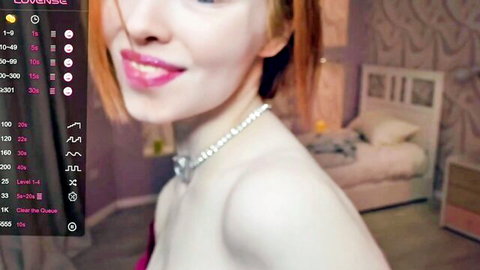 Smiling redhead camgirl topless in pearl necklace, live preview