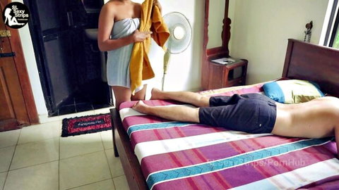 Indian MILF in towel teases shirtless stepbro on bed in steamy threesome preview