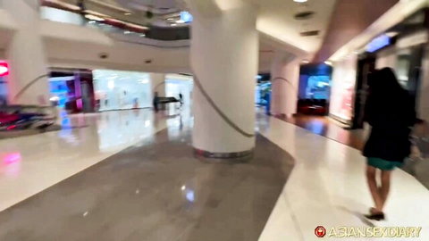 Asian women in coats walking through modern mall, ASD bonus scene Ep 1