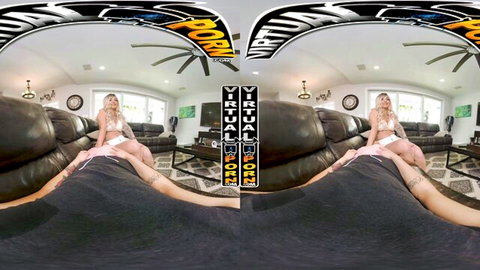 Blonde with huge tits teases reverse cowgirl on black stud's lap exposing massive boobs in VR