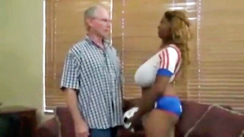 Curvy ebony BBW with huge tits and big ass in tight Adidas bra and shorts holds soccer ball with older white guy