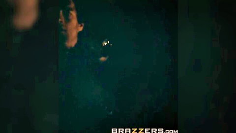 Dark shadowy Brazzers scene with mysterious figures in low light