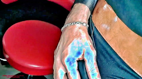 Man's veiny hand in blue light during hot anal creampie session