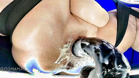 Close-up of thick hairy puffy pussy oozing creampie cum from massive black dildo insertion