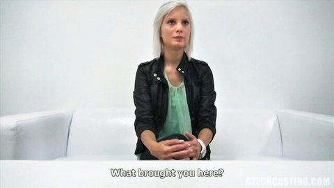 Blonde Czech babe in leather jacket interviewed during casting on white couch
