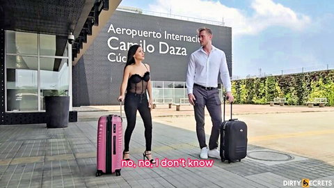 Hot Colombian woman in black lace top and heels with stranger at airport