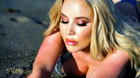 Savannah Bond in sultry beach bikini pose, blonde beauty with big tits