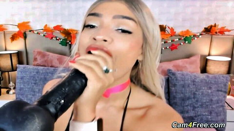 Blonde mixed babe sucking huge black dildo in steamy webcam tease
