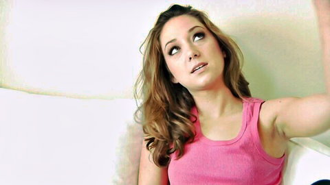 Jada Stevens in pink tank top, seductive upward gaze