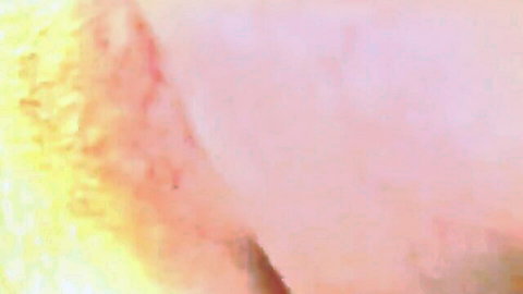 Amateur girl with tongue out covered in thick cumshot dripping from mouth