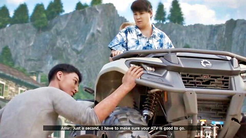 Two Asian men repairing Can-Am ATV in rocky mountains outdoors
