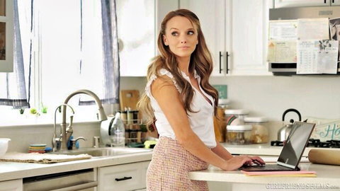Pristine Edge in white ruffled top and skirt, seductive kitchen pose