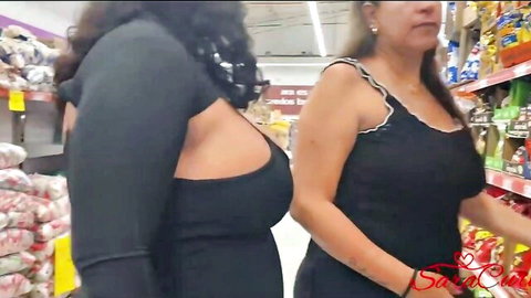 Busty Latinas in revealing tops shopping in supermarket aisle