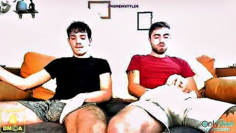 Tyler and Andrew lounging on couch before amateur anal sex, tattooed gay couple