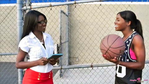 Sexy ebony MILF in tight red skirt and babe in basketball jersey flirting on court with big tits visible