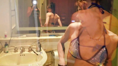 Shrooms Q skinny model posing sexy in sparkly bikini mirror reflection