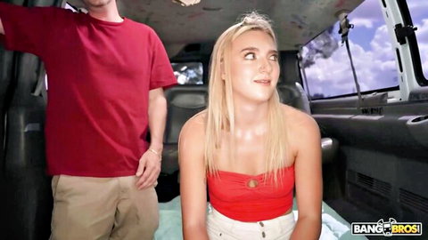 Blonde babe in red tube top and shorts smiles as guy gropes her thigh in van