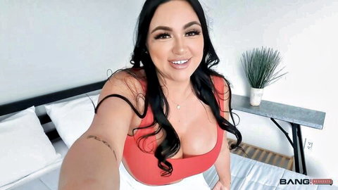 Zoey Foxx sexy red top cleavage smile in adult video