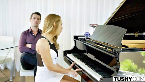 Carter Cruise in sexy white dress playing piano, eyed by man for hard fuck