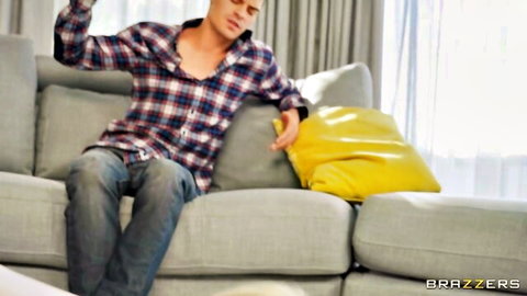 Roxy Risingstar and handsome stud on couch in teasing Brazzers scene