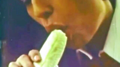 Vintage man in suit sensually eating banana in classic Danish porn teaser