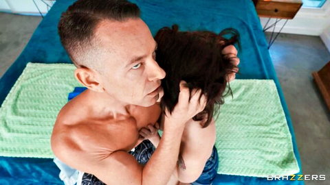 Muscular stud embraces short-haired babe in steamy Brazzers couple scene
