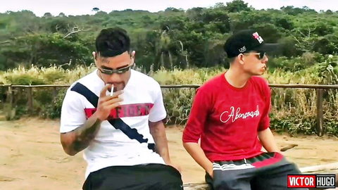 VictorHugo and Latino stud smoking on beach before fake tits bouncing action