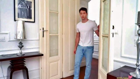 Handsome Asian man in white tee opening door for stepmom seduction