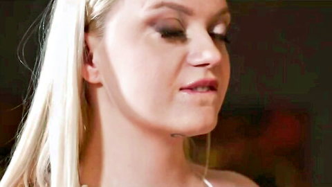 Close-up of sexy blonde with long hair, smokey eyes, and plump red lips ready to suck cock