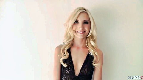 Piper Perri in black lace lingerie, smiling seductively