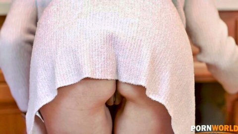 Skinny blonde MILF bends over kitchen counter exposing shaved pussy and tight ass