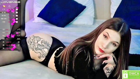 Susan Pierce sexy brunette in black lingerie and stockings with tattoos on Chaturbate