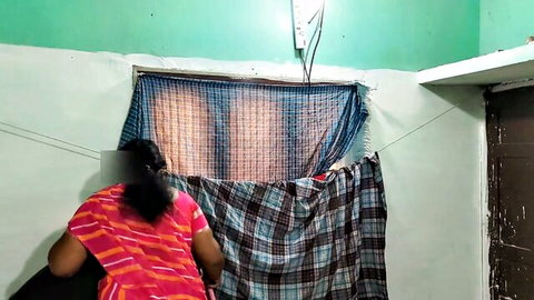 Indian mother-in-law in pink saree bending over, teasing tight ass view