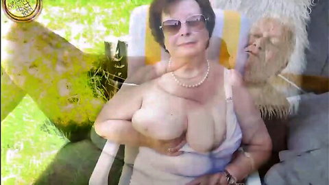 Busty mature granny with huge tits spilling from low-cut white top smiling outdoors