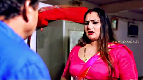 Curvy Indian BBW MILF in tight pink saree and blouse confronts man in kitchen